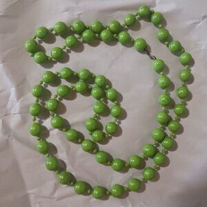 Vintage Long vivid green beaded necklace. Approximately 52"